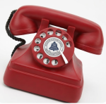 Vintage red rotary dial telephone